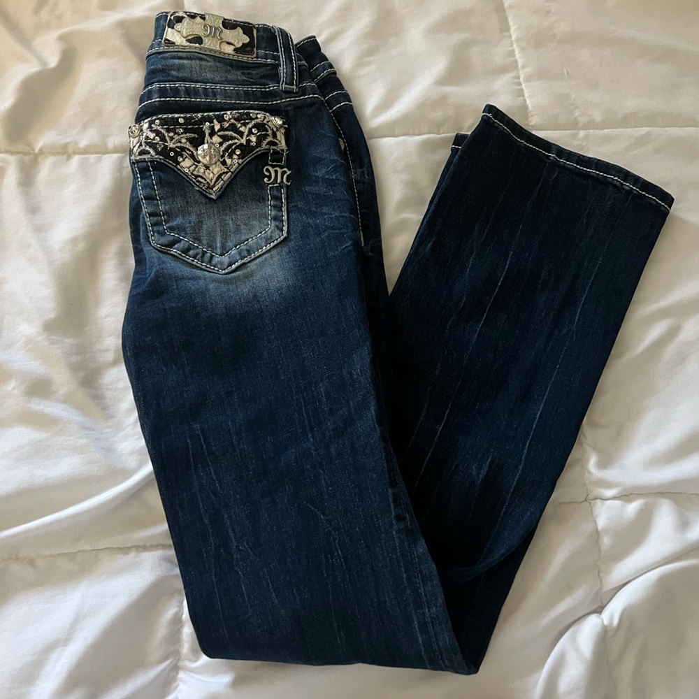 Miss Me cow print boot cut jeans